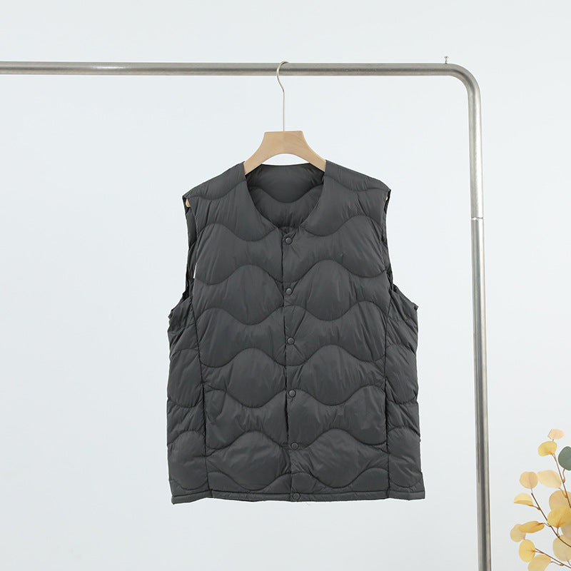 Damen Ärmellose Thermo‑Steppweste mit wellenförmiger Steppung und Druckknopfverschluss Drune
