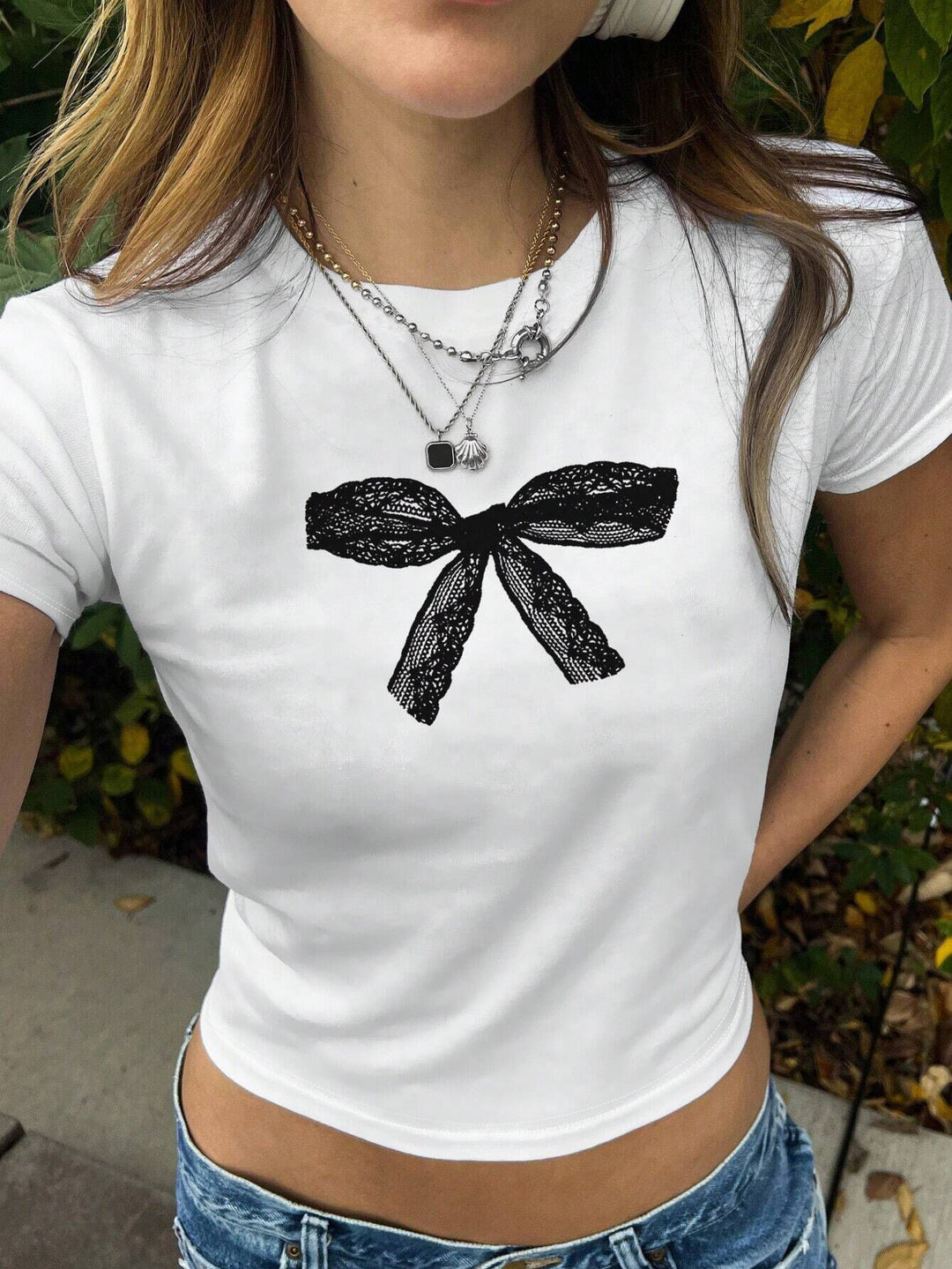 Damen T-Shirt mit verspieltem Katzenmotiv und zarten Flügeln Drune