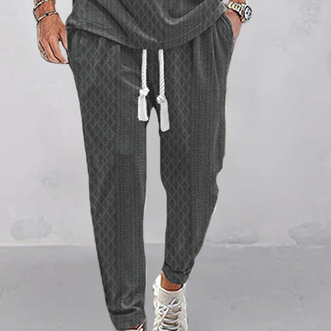 Herren Slim-Tapered Joggerhose im Struktur-Design mit Kordelzug und Eingrifftaschen Drune