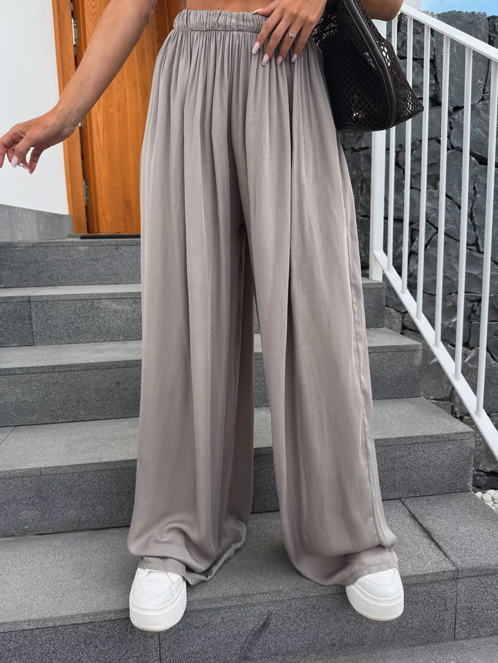 Damen weit geschnittene Palazzo-Hose mit hohem elastischem Bund und fließendem Jersey Drune