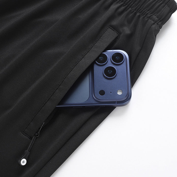 Herren Slim-Fit Sportive Jogginghose mit elastischem Bund und Reißverschlusstaschen Drune
