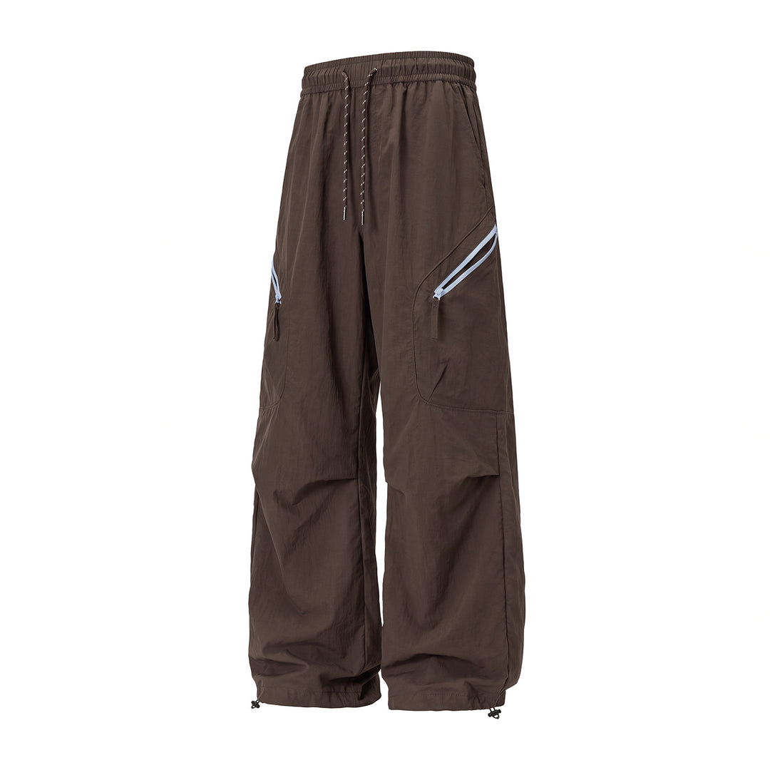 Unisex Weite Outdoor-Cargohose mit Kordelzugbund, schrägen Reißverschlusstaschen und verstellbarem Beinabschluss Drune