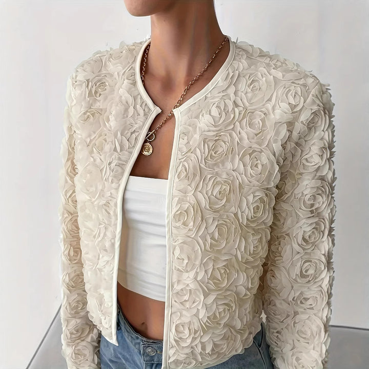 Damen kurz geschnittene Blütenjacke mit floralem Design und sanften Texturen Drune