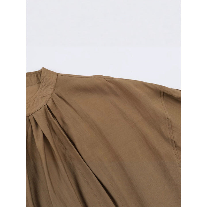 Damen Kurz geschnittene plissierte Blousonjacke mit Ballonärmeln und Smockbund Drune