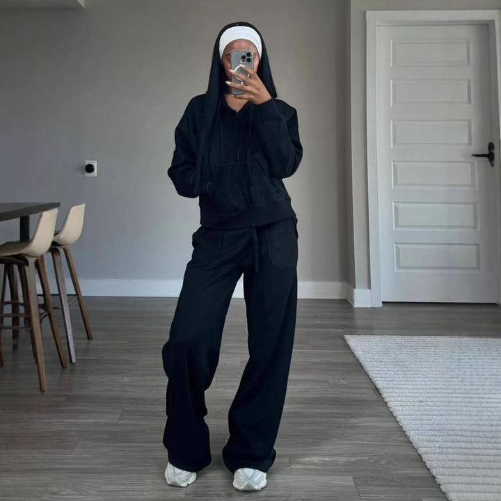 Damen Sportanzug mit modernem Hoodie und weiten Hosen Drune