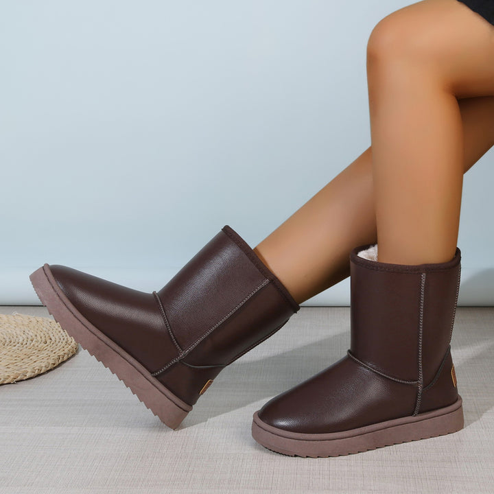 Damen Winterstiefel mit Teddyfutter, Lederoptik und flacher Plateau‑Sohle Drune