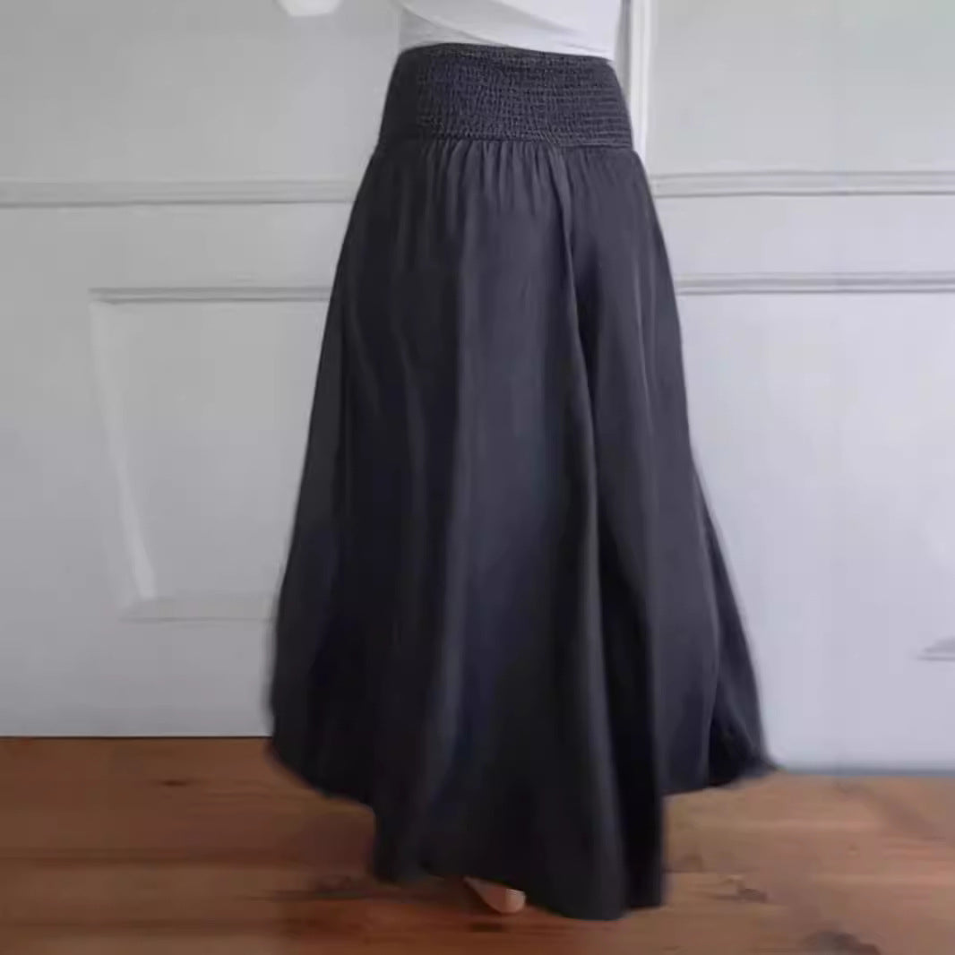 Damen-Maxi-Rock mit hohem Smockbund, weitem Fall und seitlichen Taschen Drune