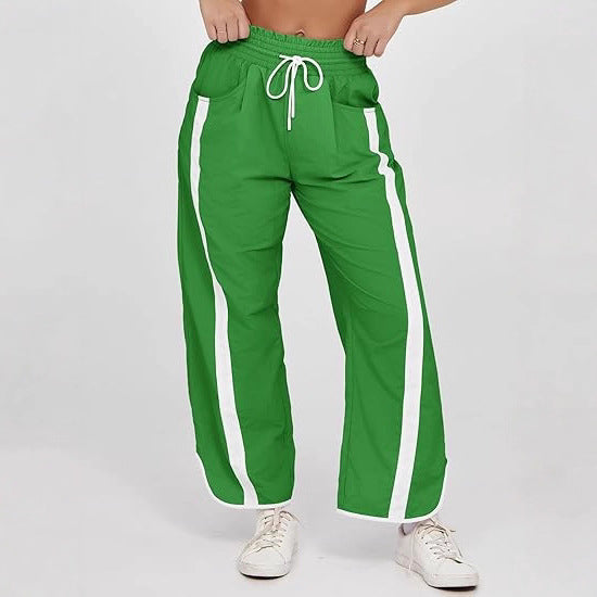 Damen nan relaxte Trackpants mit seitlichem Kontraststreifen, elastischem Smokbund und Eingrifftaschen Drune