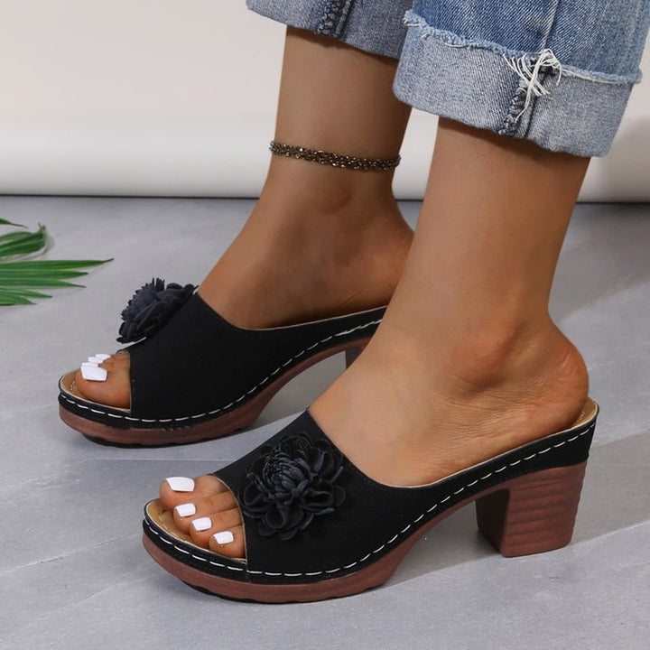 Damen Lederoptik-Peeptoe Mules mit Blütenapplikation und mittlerem Blockabsatz Drune