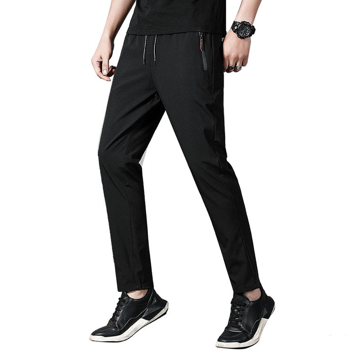 Herren schmal geschnittene Tech-Chino Jogginghose mit elastischem Kordelbund, verdeckten Reißverschlusstaschen und vorgeformten Knien Drune