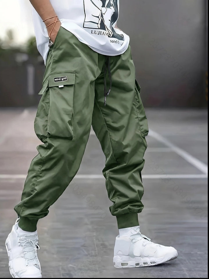 Herren Tapered Cargo-Joggerhose mit elastischem Tunnelzug, verstärkten Klappentaschen & gerippten Knöchelbündchen Drune