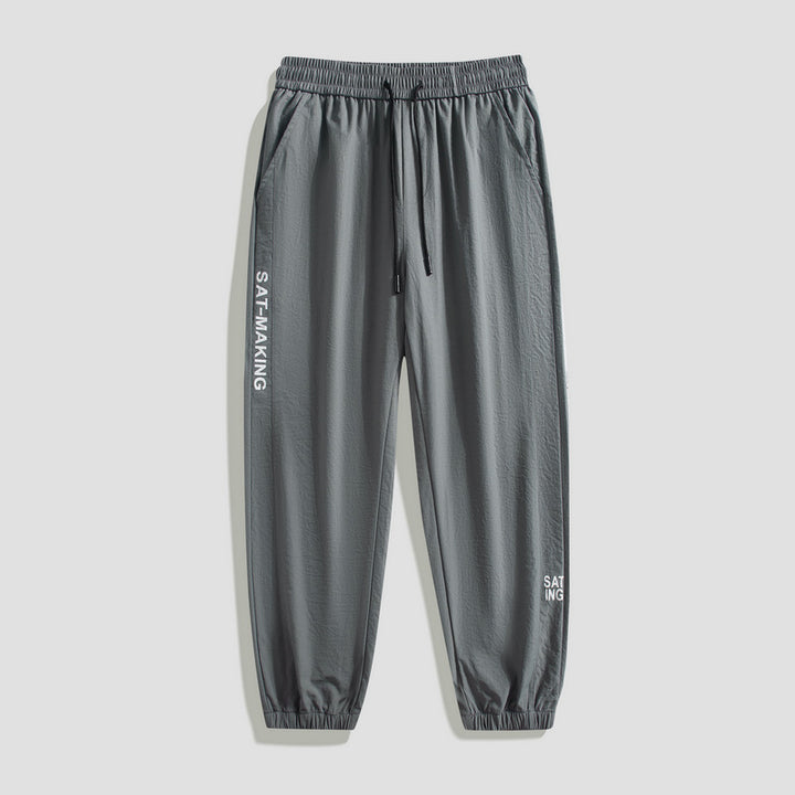 Herren Sportliche Jogginghose mit elastischem Bund und Reißverschlusstaschen Drune