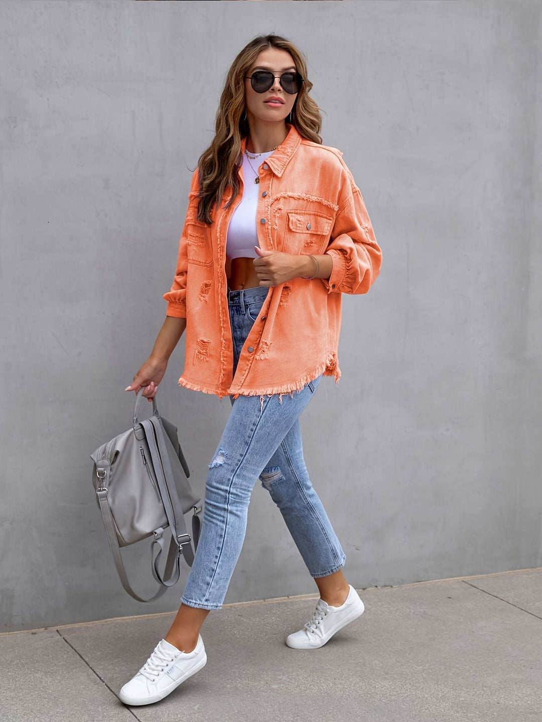 Damen oversized Jeansjacke mit fransigen Säumen und aufgesetzten Taschen Drune