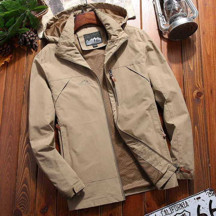Herren Wasserabweisende Softshelljacke mit Fleece Innenfutter, Kapuze und Brusttasche Drune