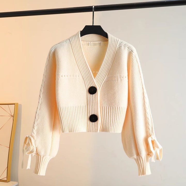Damen modische Strickjacke mit voluminösen Ärmeln und Knopfdetails Drune