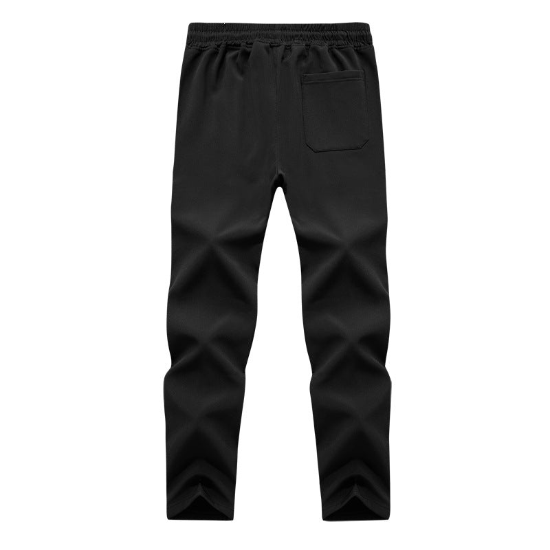 Herren Konisch zulaufende Tech-Jogginghose mit elastischem Bund, Reißverschlusstaschen und atmungsaktivem Funktionsmaterial Drune