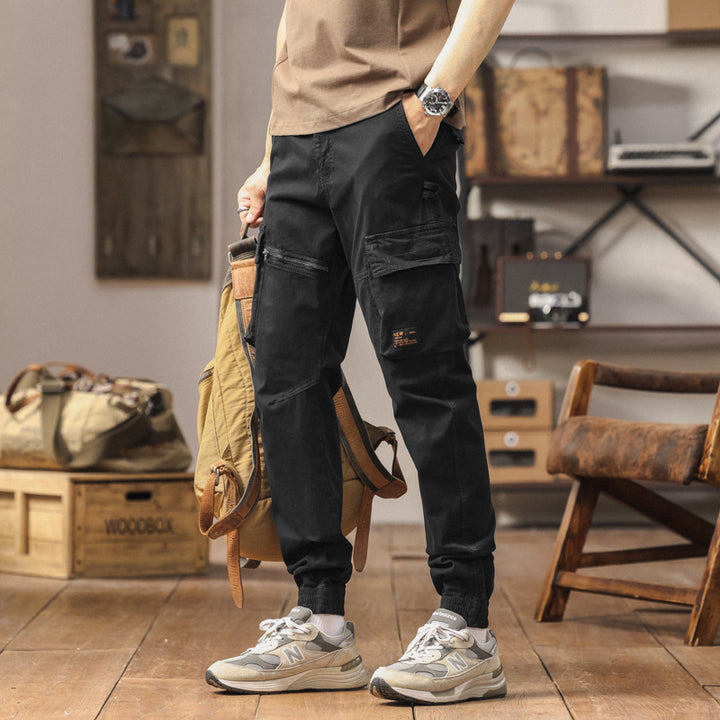 Herren Konisch geschnittene Cargo-Jogginghose mit Mehrfach‑Taschen, Reißverschluss‑Beintasche und elastischem Knöchelabschluss Drune