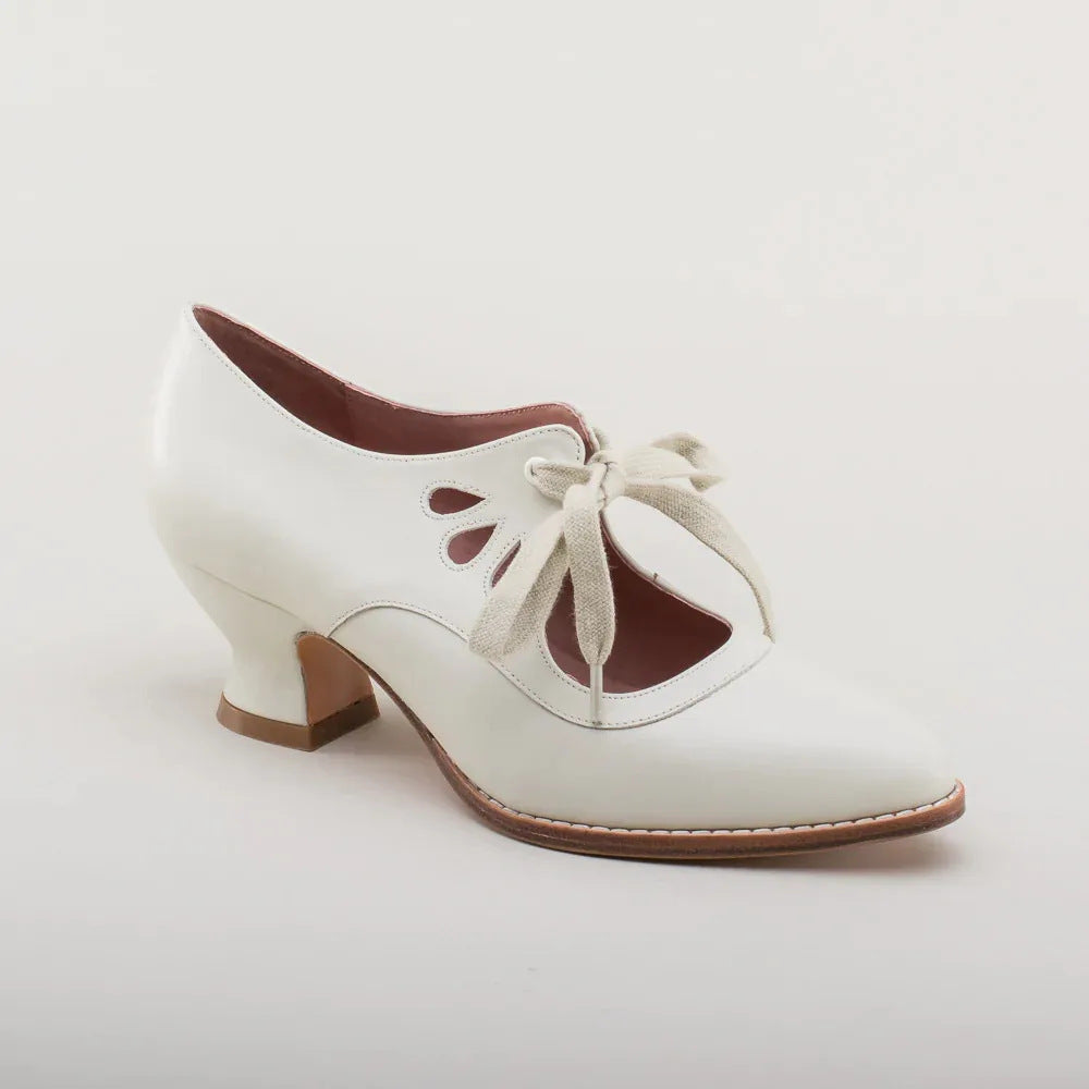 Damen nan Vintage-inspirierte Mary-Jane Pumps mit geschwungenem Mittelhochabsatz und Zierlochung Drune