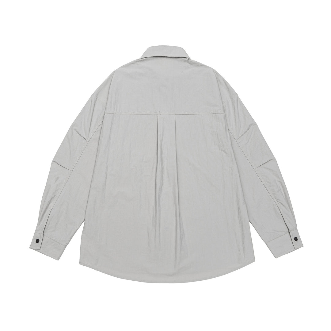 Unisex Leichtes Overshirt im Coach-Stil mit Hemdkragen und Brustprint Drune