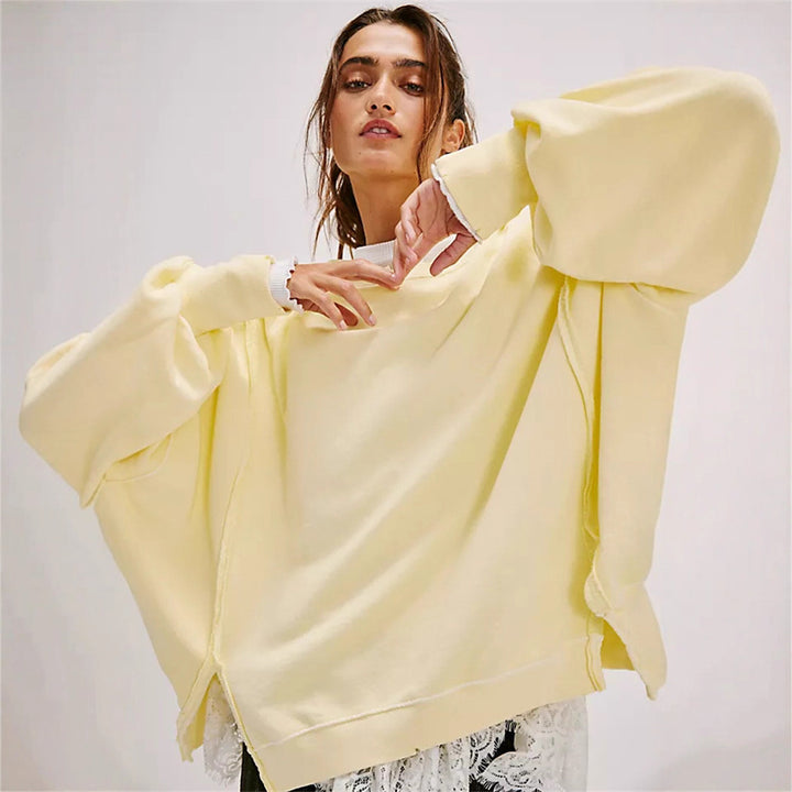 Damen oversized Sweatshirt mit Ballonärmeln, offenen Saumnähten und seitlichen Schlitzen Drune