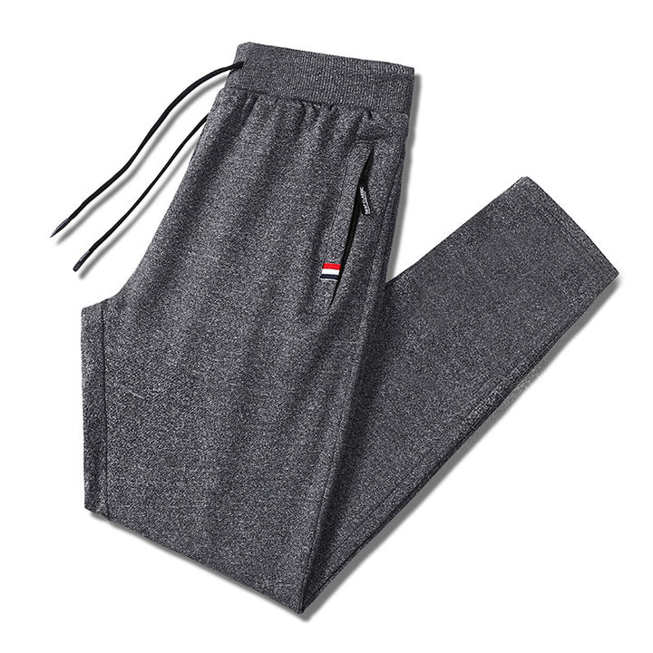 Herren Slim-Fit Jogginghose mit elastischem Rippbund, Kordelzug und Reißverschlusstaschen Drune