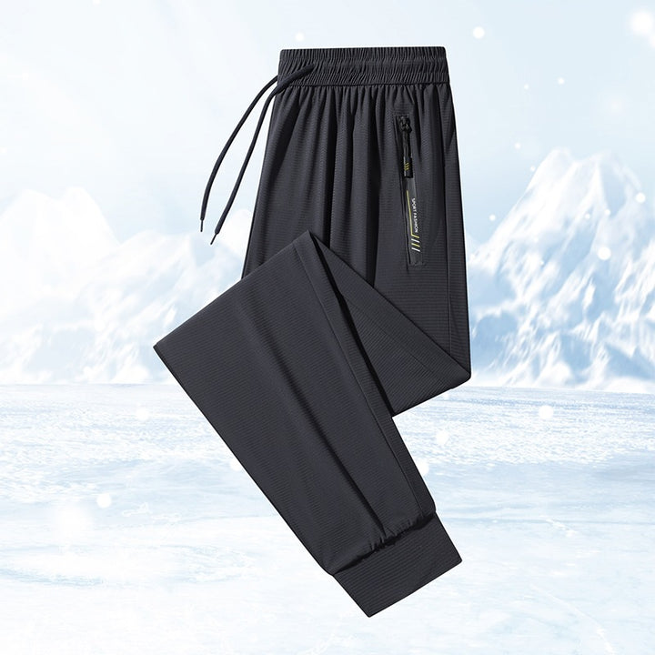 Herren Funktionspants mit elastischem Bund und praktischen Reißverschlusstaschen Drune