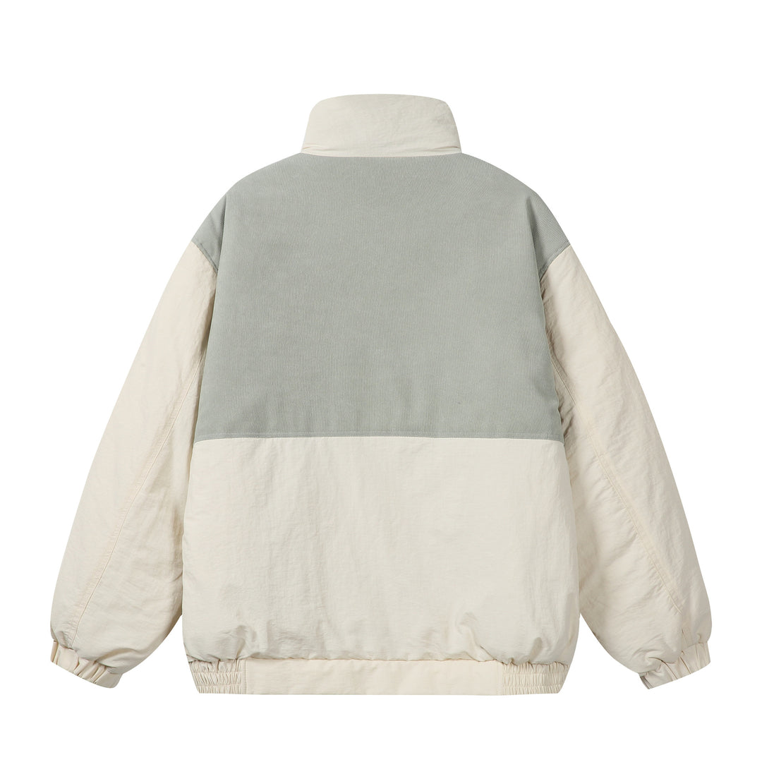 Unisex Boxy-Pufferblouson mit hohem Stehkragen, Cord-Schulterpasse und großen Pattentaschen Drune