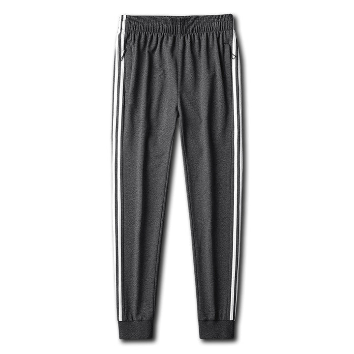 Herren Slim-Fit Trackhose mit seitlichen Kontraststreifen, Reißverschlusstaschen und elastischem Bund Drune