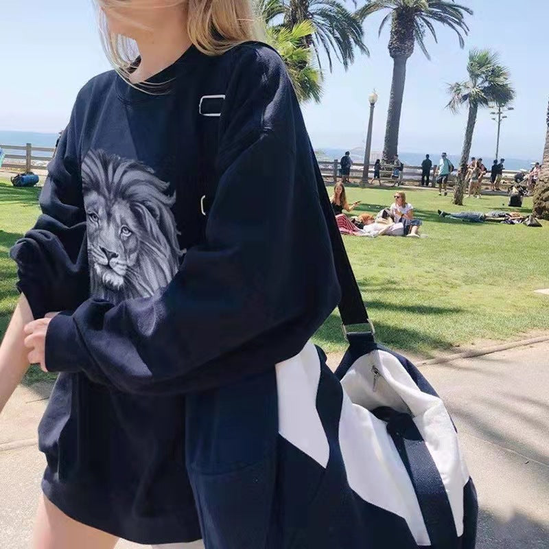 Damen nan oversized Sweatshirt mit fotorealistischem Löwenprint, Relaxed‑Fit und geripptem Rundhalsausschnitt Drune