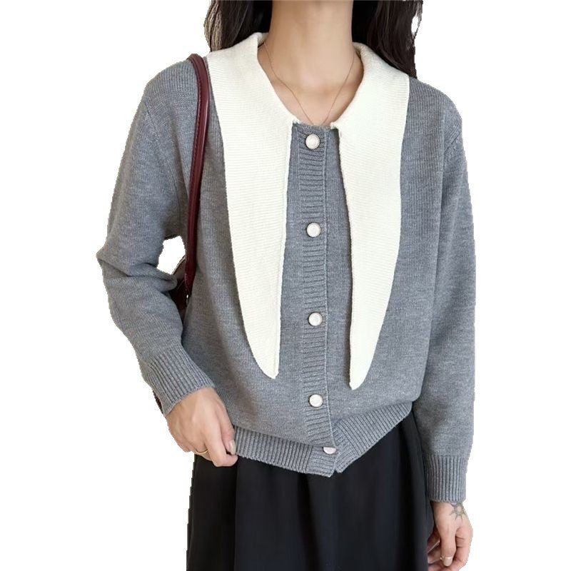 Damen modische Strickjacke mit dekorativem Schal und Knopfdetails Drune