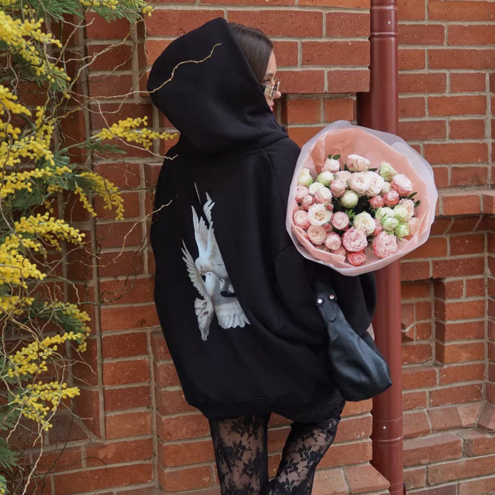 Damen Kapuzensweater mit kunstvollem Vogelmotiv und entspannter Passform Drune