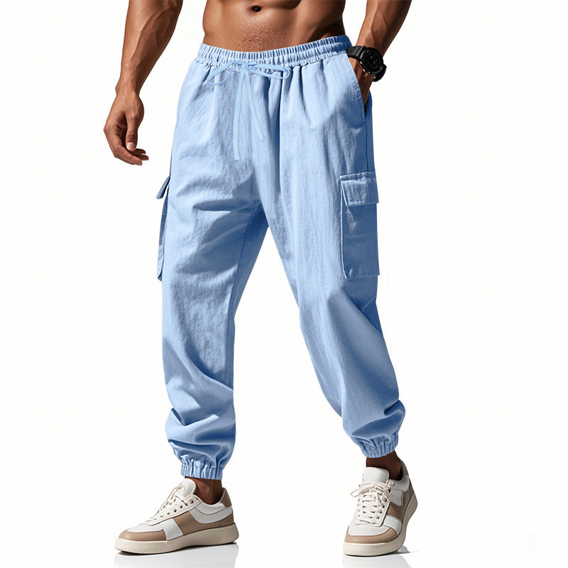 Herren nan konisch zulaufende Jogger im utilitarischen Stil mit elastischem Bund, Kordelzug und Klappentaschen Drune