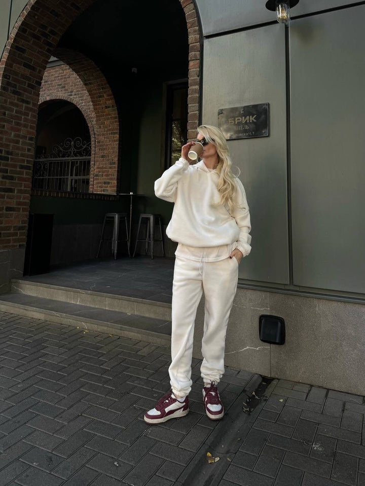 Damen kuscheliges Sweat-Set mit extralangem Kapuzenpullover, verdeckter Kängurutasche und schmal zulaufender Bündchenhose Drune