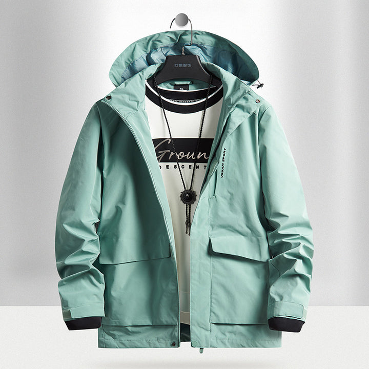 Herren wasserdichte Stadt-Outdoorjacke mit Kapuze, verdecktem Reißverschluss und Cargo-Taschen Drune