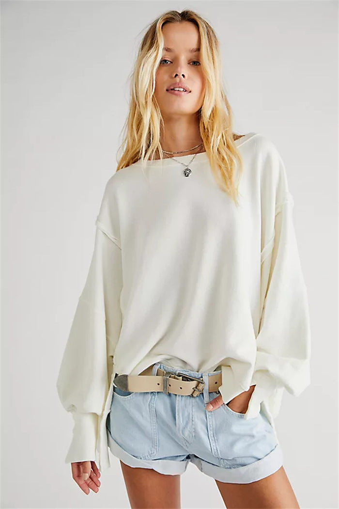 Damen oversized Sweatshirt mit Ballonärmeln, offenen Saumnähten und seitlichen Schlitzen Drune