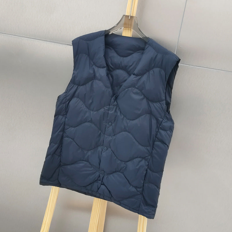 Damen Ärmellose Thermo‑Steppweste mit wellenförmiger Steppung und Druckknopfverschluss Drune