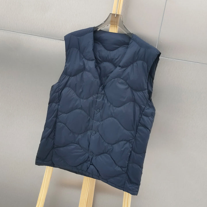 Damen Ärmellose Thermo‑Steppweste mit wellenförmiger Steppung und Druckknopfverschluss Drune
