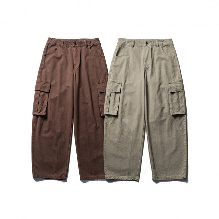 Unisex Weite Cargo-Hose im Baggy‑Schnitt mit tiefem Schritt, aufgesetzten Klappentaschen und cleanem Finish Drune