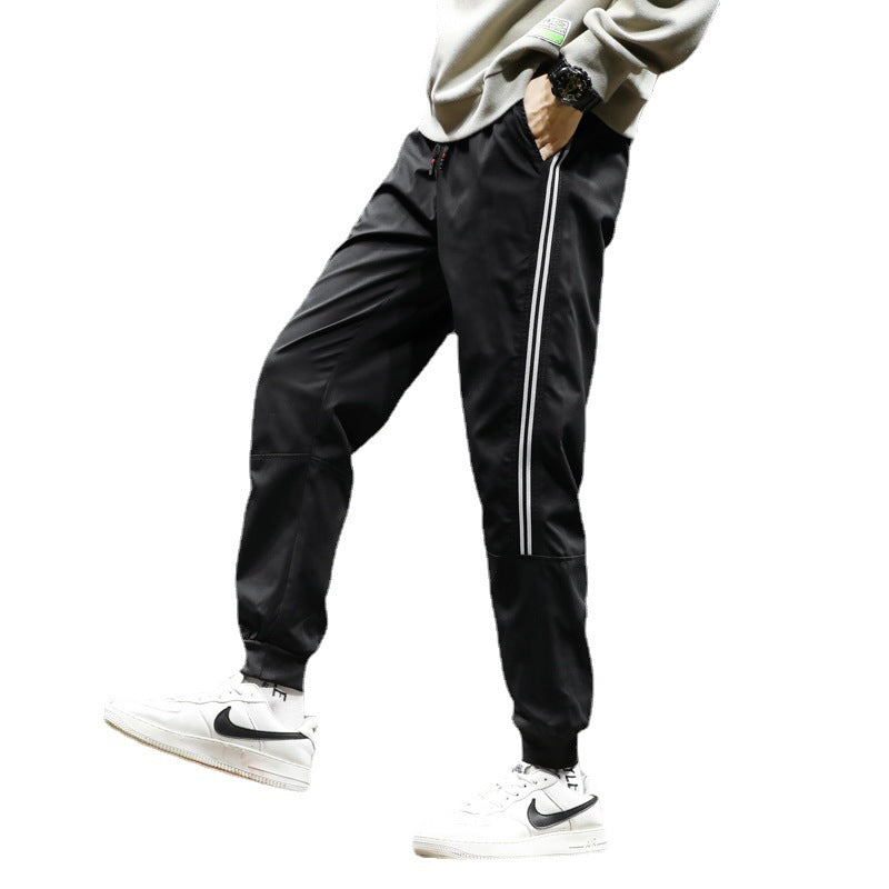 Herren Sportliche Nylon-Joggerhose mit elastischem Bund und seitlichen Kontraststreifen Drune