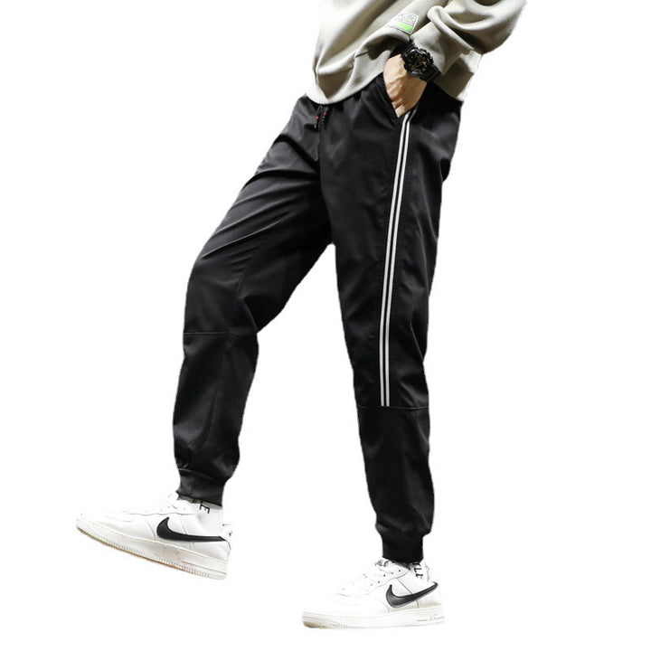 Herren Sportliche Nylon-Joggerhose mit elastischem Bund und seitlichen Kontraststreifen Drune