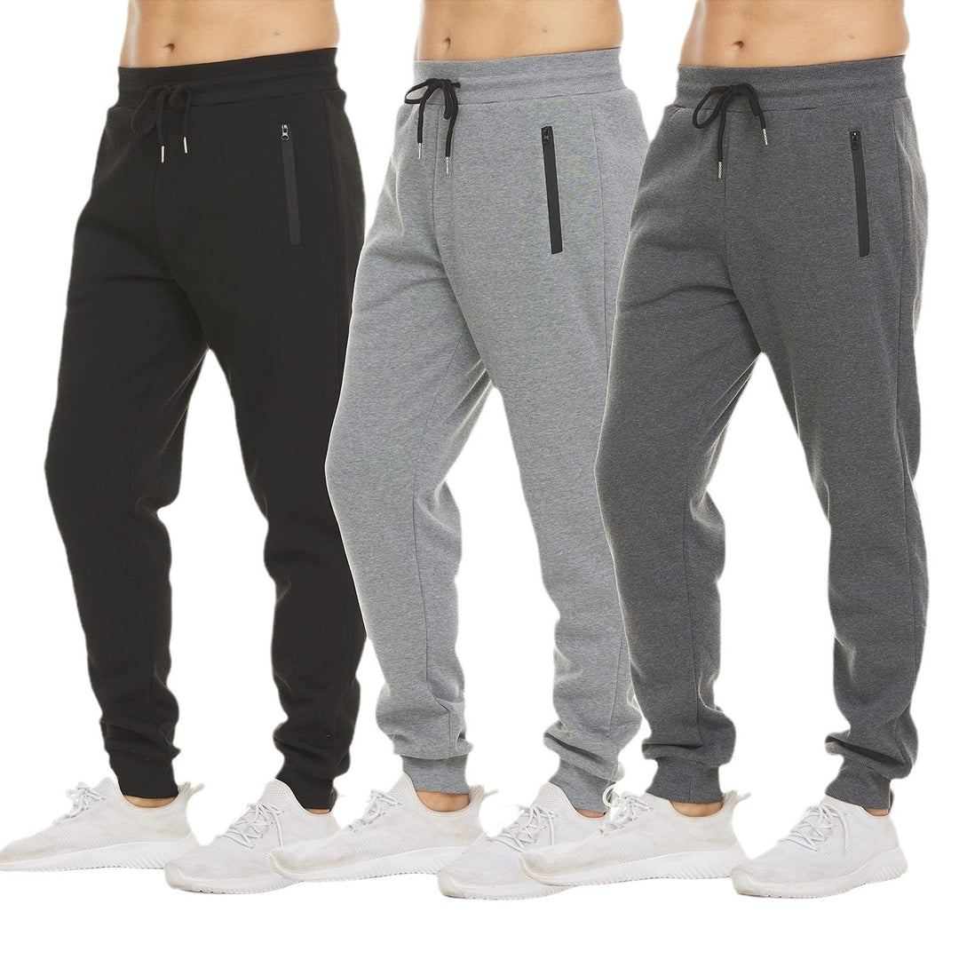 Damen nan tapered Jogginghose mit elastischem Komfortbund, wasserabweisender Reißverschlusstasche und geripptem Knöchelabschluss Drune