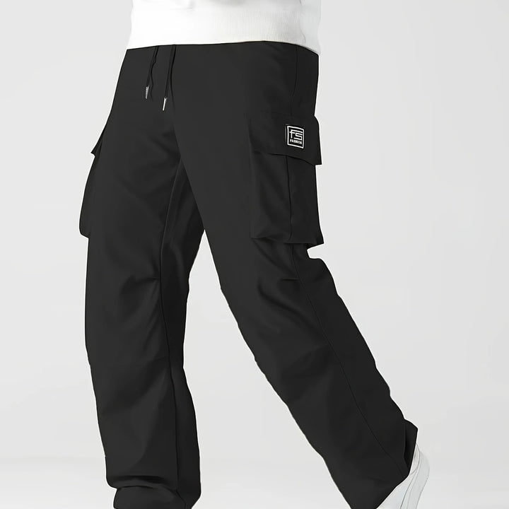 Herren Relaxed Cargo-Hose mit Tunnelzugbund, großen Klapp‑Utilitytaschen und geradem Bein Drune