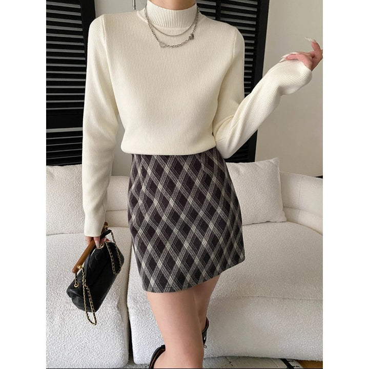Damen figurbetontes Strickoberteil mit hohem Kragen und eleganten Rippdetails Drune