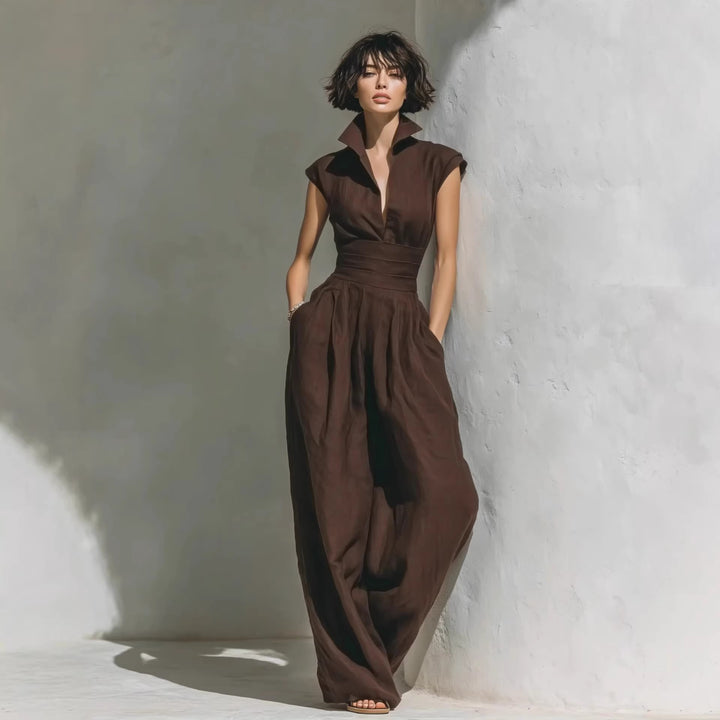 Damen Jumpsuit mit weitem Bein, tailliertem Wickelbund und Stehkragen Drune