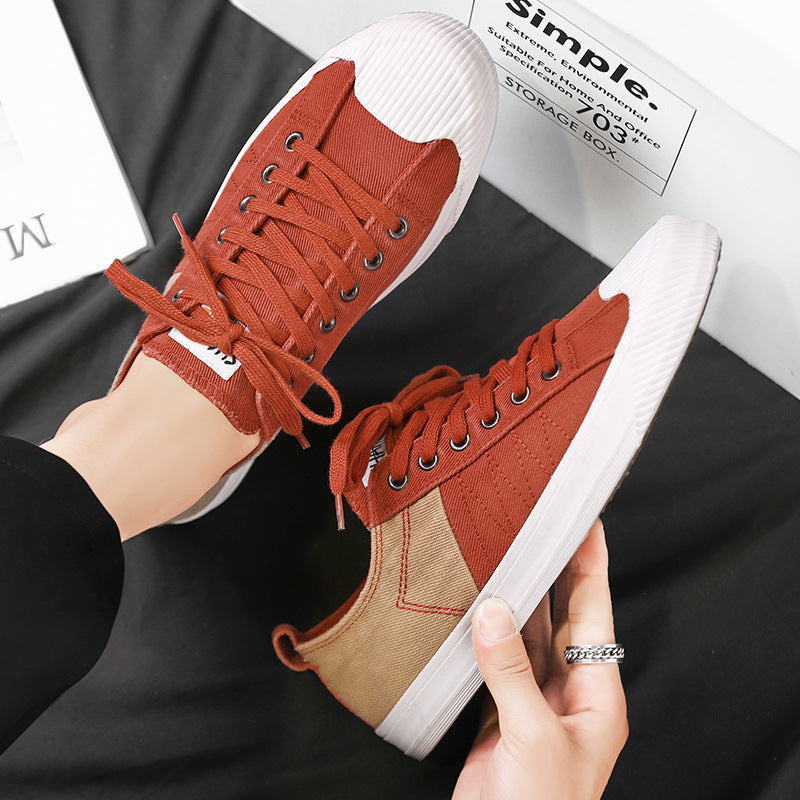 Unisex niedrige Canvas-Sneaker mit verstärkter Gummi-Zehenkappe und kontrastierenden Textilpaneelen Drune