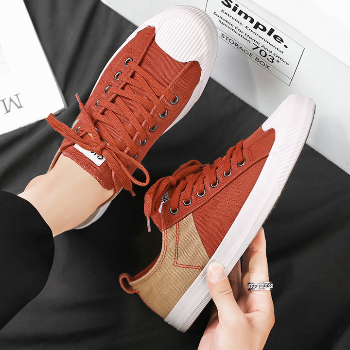 Unisex niedrige Canvas-Sneaker mit verstärkter Gummi-Zehenkappe und kontrastierenden Textilpaneelen Drune