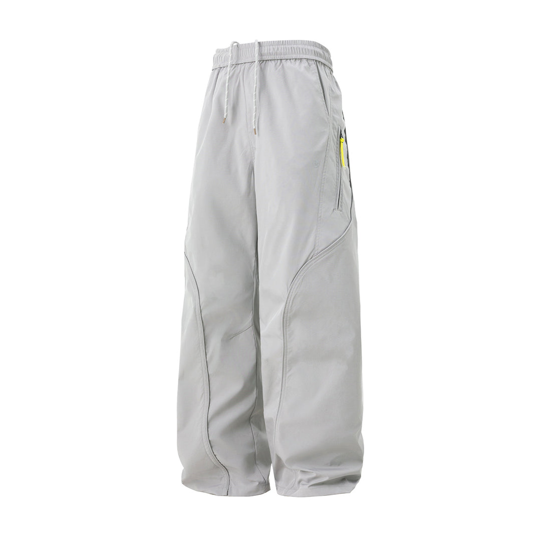 Unisex Weite Nylon-Freizeithose mit Tunnelzug und Reißverschlusstasche Drune