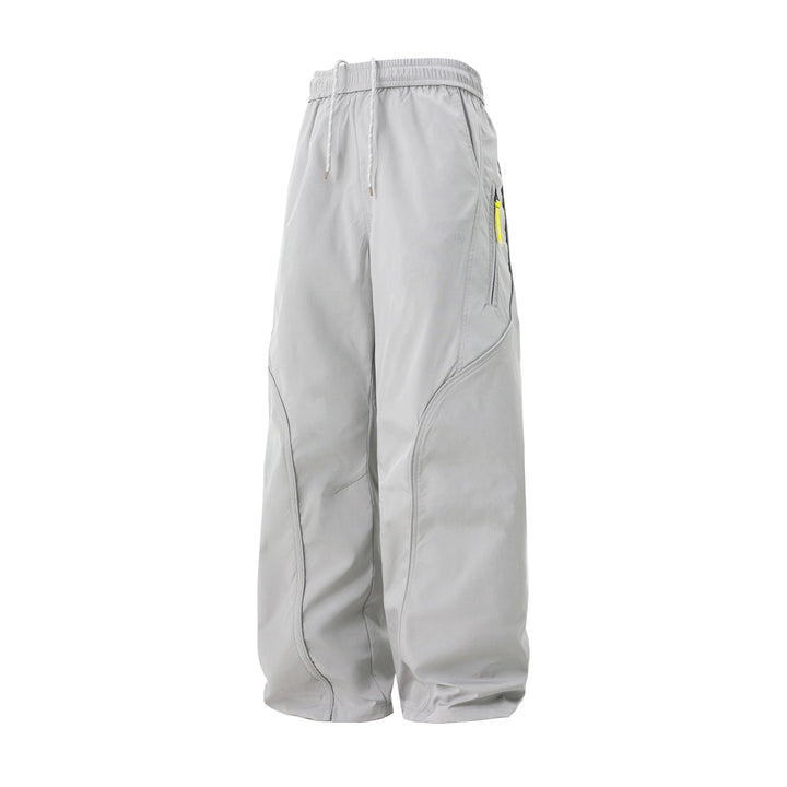 Unisex Weite Nylon-Freizeithose mit Tunnelzug und Reißverschlusstasche Drune