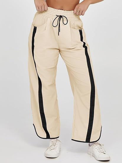 Damen nan relaxte Trackpants mit seitlichem Kontraststreifen, elastischem Smokbund und Eingrifftaschen Drune