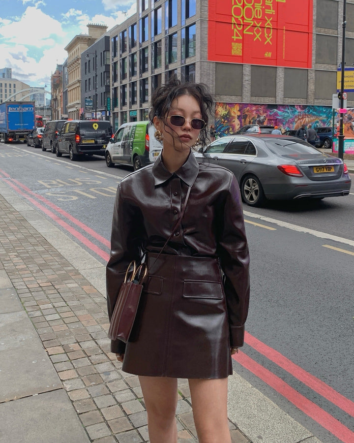 Damen elegante Kunstlederjacke mit funktionalen Knöpfen und taillierter Silhouette Drune